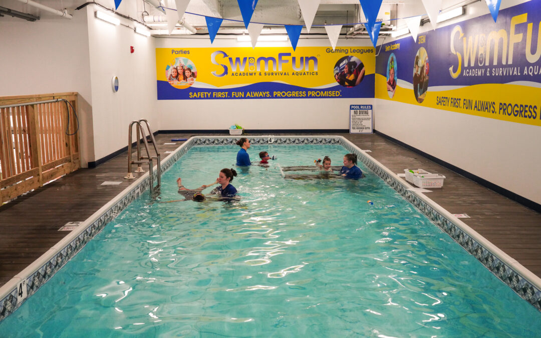 Child practicing swim skills at Turtle Cove Swim School